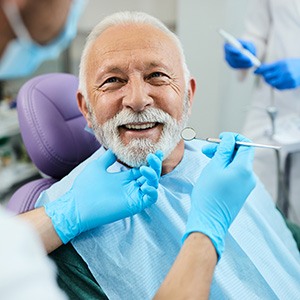 Man smiling in the dental chair